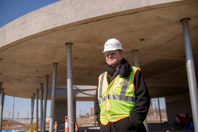 Architect Michael Van Valkenburgh stands in front of the William Davidson Sport House and basketball pavilion at what will become Ralph C. Wilson, Jr. Centennial Park, in Detroit, March 28, 2024.