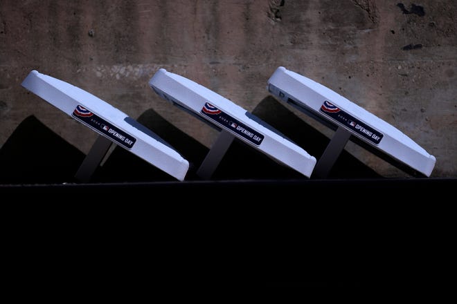 MLB bases with the Opening Day logo sit in the dugout before the White Sox home opener against the Tigers.