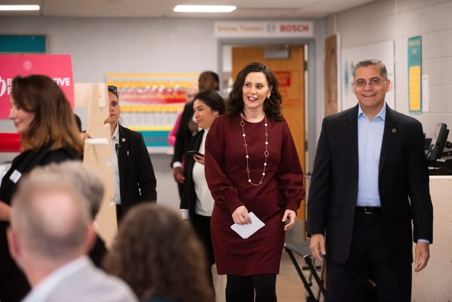 Governor Gretchen Whitmer, left, and United States Secretary of Health and Human Services Xavier Becerra, right, arrive to take part in a roundtable discussion on reproductive freedom on Thursday, March 28, 2024 at the Hawk Community Center in Farmington Hills.