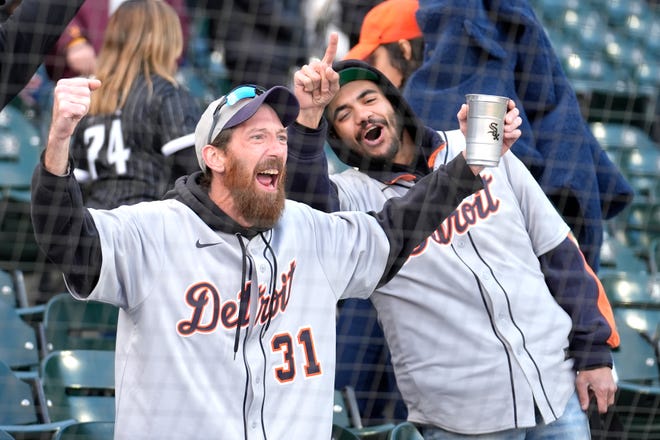 Tigers fans celebrate the team's 1-0 shutout win over the White Sox.