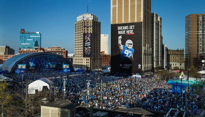 Thousands of football fans wait in downtown Detroit for the 2024 NFL Draft to begin on Thursday, April 25, 2024.