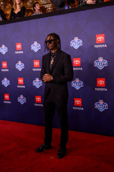 Ohio State wide receiver Marvin Harrison Jr. poses for photos during the NFL Draft red carpet arrival, at the Fox Theatre, in Detroit, April 25, 2024.