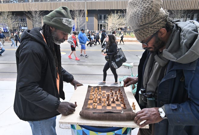 Neo Nazar and C.D.K play chess along Woodward Avenue as fans of all teams enjoy the 2024 NFL Draft. "I think this is the best thing ever, because the crowd right now is giving me excitement to be able to beat him. If it wasn't for the crowd I don't thing I would beat him." C.D.K. responds with, "No response."