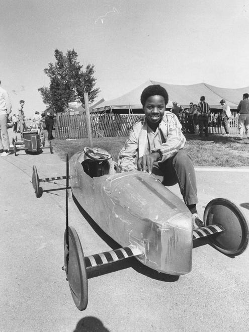 Gerald Browder, 14, with his car in 1970.