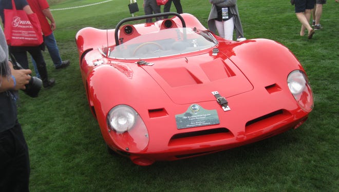 Petra Buschmeier  of Diepenau-Nordel, Germany, owns this 1966 Bizzarrini P538 Can-Am, powered by a Lamborghini 420-horsepower 4.0-liter V-12 with six two-barrel carburetors.