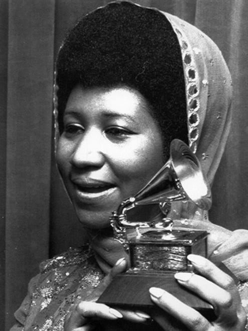 Franklin holds her Grammy March 15, 1972, after she took top honors for the fifth straight year. The award was for her rendition of "Bridge over Troubled Water."