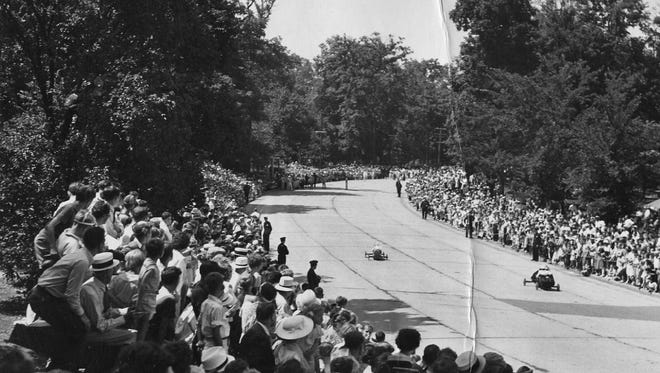 The Detroit race was run on a special track set up in Rouge Park. Above, spectators watch the 1937 finals.