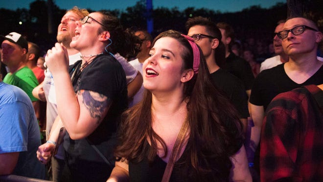 Fans cheer Weezer at DTE Energy Music Theater in Clarkston, Michigan on Friday, July 13, 2018. The Pixies played first on a double bill. (John T. Greilick, The Detroit News)