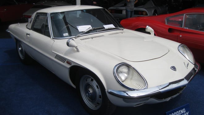 This 1969 Mazda Cosmo Series II, a great example in 1969 of Mazda's rotary-powered cars, sold for $101,750.