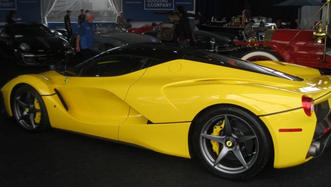 This 2015 Ferrari LaFerrari is one of 120 built for the U.S. market. With some 200 miles on it and a bright Giallo Modena exterior over black leather with yellow trim, the LaFerrari sold for $3,520,000.