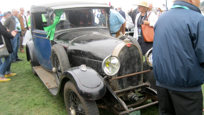 Unrestored cars fascinate visitors to concours like Pebble Beach, where most entrants are in like-new condition. This 1930 Bugatti Type 44 Fiacre, with original wooden steering wheel, is one of only eight built by Jean Bugatti. Bradley R. Farrell of South Salem, N.Y. is the current owner.