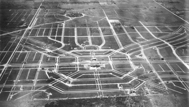 In 1930, The Detroit News took extensive aerial photographs of the Detroit area.  This view is of the Louise Lathrup Subdivision along Southfield Road,  looking west, at an altitude of 3500 feet.  Few buildings stood at the time; the area would be incorporated as  the city of Lathrup Village in 1953.