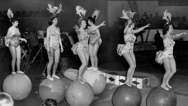 These acrobats are on the ball at the Ringling Bros. and Barnum & Bailey Circus in 1959.