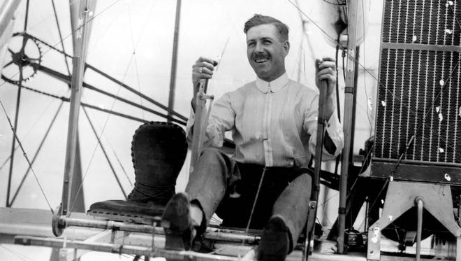 William E. Scripps, son of the founder of The Detroit News, was the first man in Michigan to own and fly an airplane. Here, he grabs the controls of a Burgess & Curtiss flying boat in 1910. It was built under Wright patents and was a duplicate of the original Wright brothers' plane.