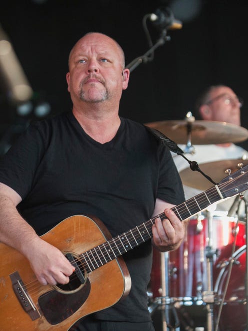 Pixies singer/guitarist Black Francis performs with the band at DTE Energy Music Theater in Clarkston.