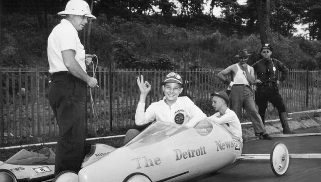 Johnny Studnicky helps son John P. Studnicky Jr.,  the 1947 Soap Box Champ.  Building the racers required thought, labor and purpose. The youths were encouraged to build racers that were better than the rest, not unlike what the Motor City itself did on a much larger scale.