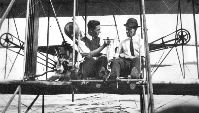 William E. Scripps, right, gets some flying tips from Walter R. Brookins, the first pilot trained by the Wright brothers for their exhibition team. Scripps would go on to become president of The Detroit News and founder of WWJ radio, and promoted aviation throughout his life.
