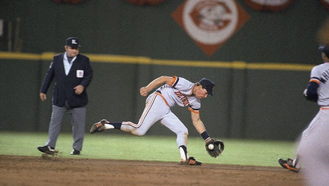 Detroit Tigers shortstop Alan Trammell goes to his left to snare a ground ball during the 1984 World Series game against the San Diego Padres in San Diego.