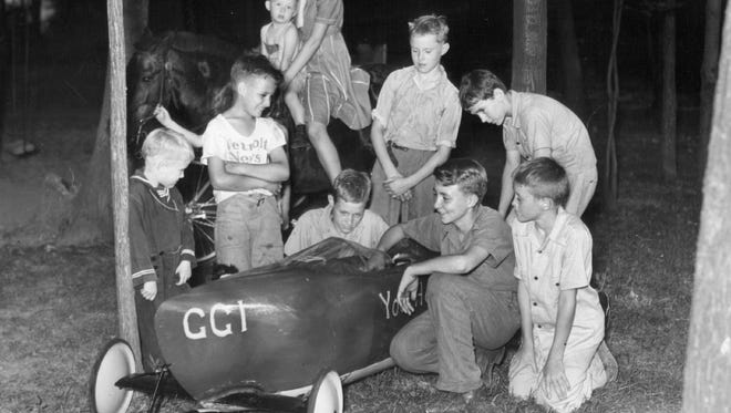 Billy White, 1941 Detroit News Soap Box champ, was the bigshot on his Royal Oak block the Sunday after the race. His pals crowded around to see the car that proved the fastest in Wayne, Oakland and Macomb counties that year.