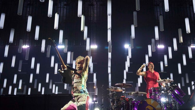 Red Hot Chili Peppers Bassist Flea (Michael Peter Balzary) and drummer Chad Smith (Bloomfield Hills) play Red Hot Chili Peppers play Joe Louis Arena in Detroit during their Getaway World Tour.