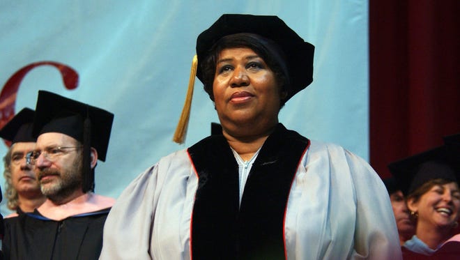 Aretha Franklin appears at Berklee College of Music's commencement May 13, 2006  in Boston. Franklin, along with singer Melissa Etheridge, received honorary degrees for their achievements in music.  (Photo by Darren McCollester/Getty Images)