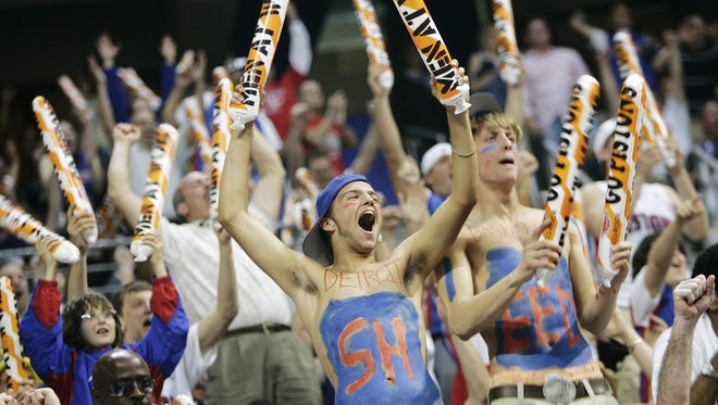 With Sheed painted across their two chests, Eric Ebner, 17, left, and Ryan Fox, 17, both of Marshall, cheer on the Pistons  on May 25, 2006.  The NBA team that has played at The Palace of Auburn Hills since it opened in 1988 will be moving to Detroit next season.