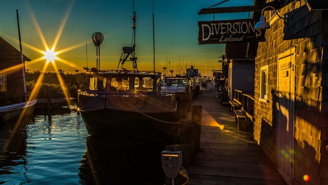 HONORABLE MENTION: "It was a Saturday morning in August,"said David Tisch of Ferndale."I decided to make the drive to Leland from Detroit, just to see the sunset. I was hoping it would look exactly like this. What a beautiful place!!!" This shot is titled "Sunset@Fishtown."