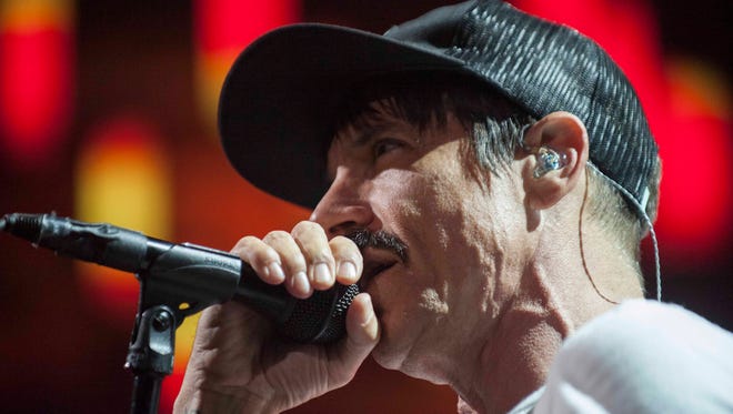 Grand Rapids native and Red Hot Chili Peppers singer Anthony Kiedis performs at Joe Louis Arena in Detroit.