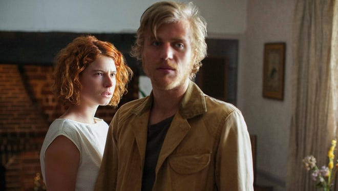 Jessie Buckley (left) and Johnny Flynn (right) star in "Beast."