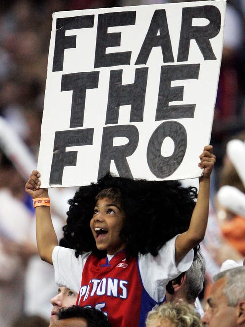Ben Wallace fan Joseph Jafri, 8, of Owosso, cheers the Pistons in Game 5 of the Eastern Conference Finals on May 31, 2006.