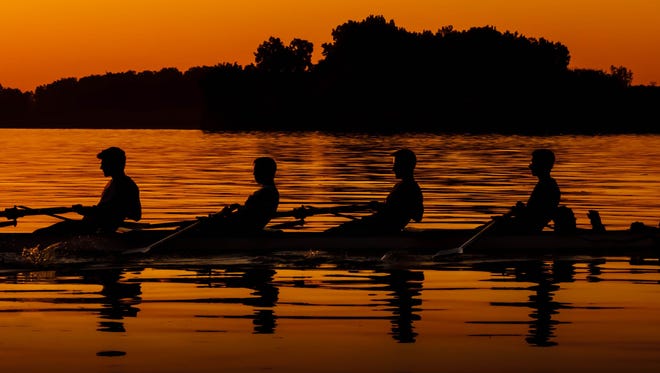 Dennis Sitek of Grosse Isle occasionally watches the Grosse Ile High rowing crew as they practice at dawn on the Detroit River.  His son is their coach. "On the morning this photo was taken everything came together, the sunrise, flat water and a great angle to the crew," he said.  "Call it being in the right place at the perfect time."