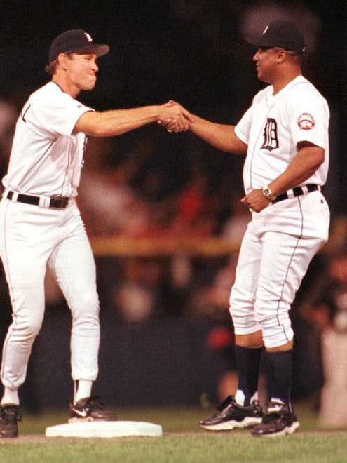 Former Detroit Tigers double play duo Alan Trammell (L) and Lou Wittaker (R) reunite during a post game ceremony after the last game ever at Detroit's Tiger Stadium, against the Kansas City Royals, 27 September 1999. The Tigers have played at this location since 1901 when they became a charter member of the American League, and will begin play at a new park in downtown Detroit next season. The Tigers defeated the Royals, 8-2.
