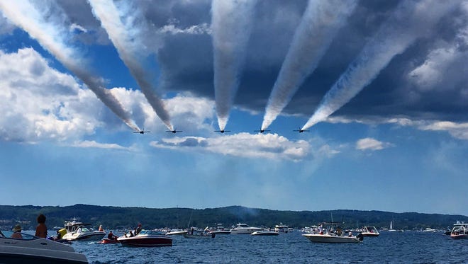"Angels," by Steffen Mammen of Traverse City.  Mammen watched the Blue Angels while they practiced their flyovers of Grand Traverse Bay. Then, for their National Cherry Festival performance, Mammen "anchored the boat strategically in their path, grabbed my camera, and waited until they flew over."