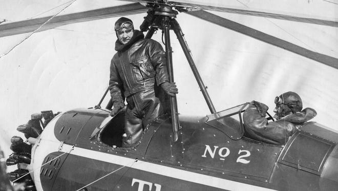 Detroit Mayor Frank Murphy gets a ride in The Detroit News' autogiro in 1931. The unpowered rotor blades rotated automatically from the wash of the powered front propeller. The aircraft could take off in a distance of only 124 feet, hover almost motionless in the air and land in area of 50 feet.