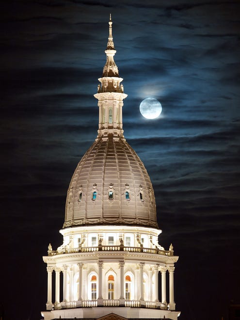 David Marvin of Lansing shot “Eerie Moon Over the Capitol” on a very cold February night.  “Because of the way the surrounding buildings are situated, the moon only lines up like this with the Capitol dome a couple times a year when you can get a good photo of the two together,” he said.