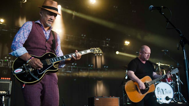 The Pixies guitarist Joey Santiago and singer/guitarist Black Francis perform at DTE Energy Music Theater in Clarkston.
