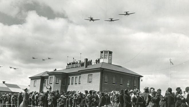 Spectators watch Michigan National Guard maneuvers at Selfridge Field on April 6,  1939.
