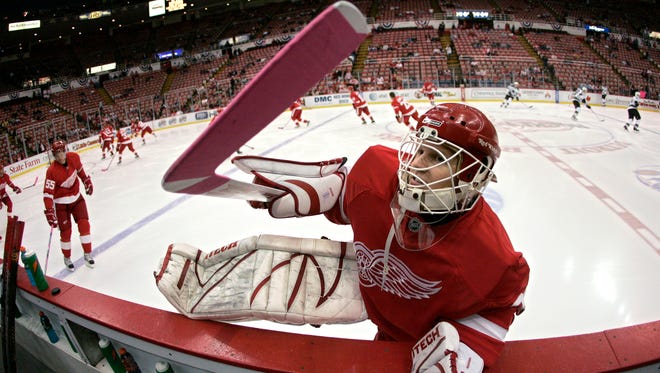 Chris Osgood warms up before the start of a game against the San Jose Sharks at Joe Louis Arena, October 26, 2007.