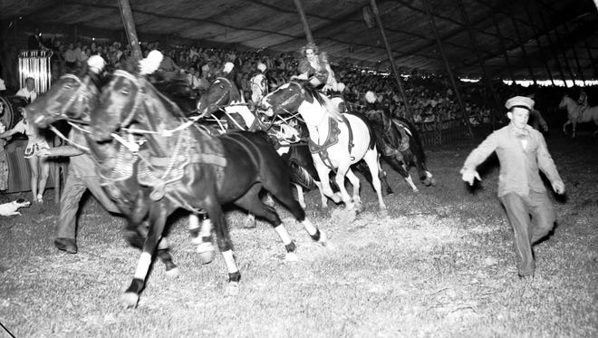 Bareback riders do their thing in the ring in a 1930 circus in Detroit.
