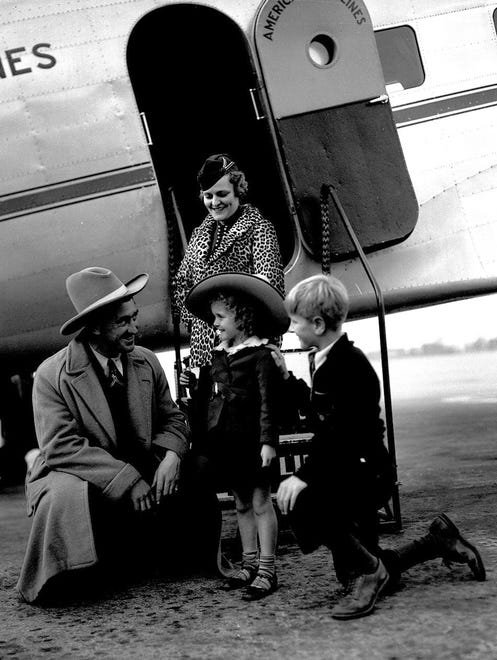 Gordon "Mickey" Cochrane of the Detroit Tigers and his family prepare to board a plane in 1935 - the year the Tigers defeated the Chicago Cubs to win the World Series.