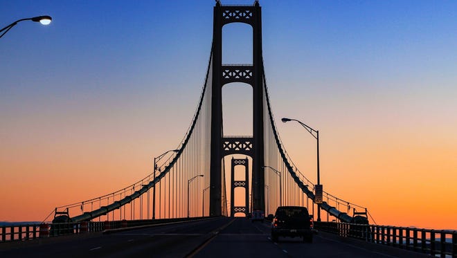 The sun was just rising over the Mackinac Bridge when Jay Hijazi of Dearborn and his friends started to cross it on their way to the Porcupine Mountains. "One of the most majestic views I have ever witnessed," he said.  He calls his shot "The Gracious Mac."