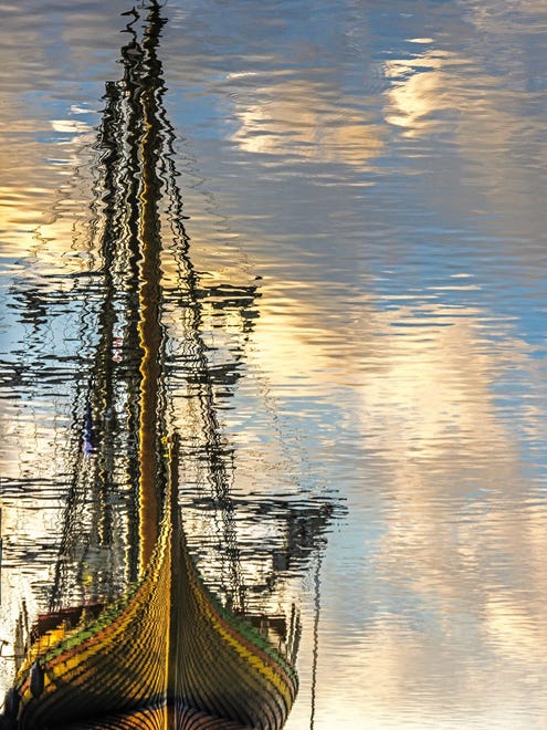 "Ghost Ship Rising," by Tom Clark of Essexville, is a reflection of two ships from the Great Lakes Tall Ship Celebration, one behind the other, on the Saginaw River in Bay City.   "The idea of creating abstract images in the water appealed to me," Clark says. "I cropped the ship's reflection at water's edge, and then flipped the image for proper perspective."