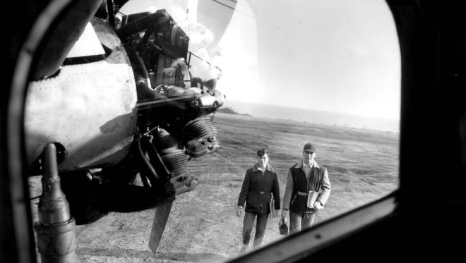 In 1954, young pilots Larry Lasch, 12, and his brother Jim, 16, approach their plane for a trip from their home on Rattlesnake Island in Lake Erie to their Put-In-Bay, Ohio school. Their brother Henry, 10, also was a pilot.