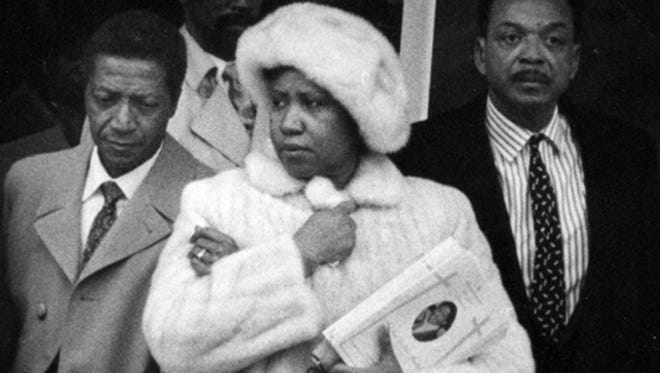 Franklin leaves New Bethel Baptist Church in Detroit after funeral services for her brother Cecil on Dec. 31, 1989.