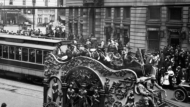 The circus band plays from the top of a fanciful carriage during a parade in Detroit in1910. The phrase "jump on the bandwagon" was coined by journalists who saw presidential candidate Zachary Taylor climbing aboard a circus bandwagon for public attention.