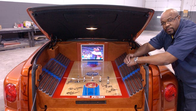 Redford Township resident Moe Essix, 41, finished his custom 2003 Chevy SSR pickup truck in a 2004 Detroit Pistons NBA World Championship motif. The bed of the pickup is a 1/25th scale of The Palace, with a hardwood floor. All 4,523 pieces were individually hand-cut, sanded and glued.