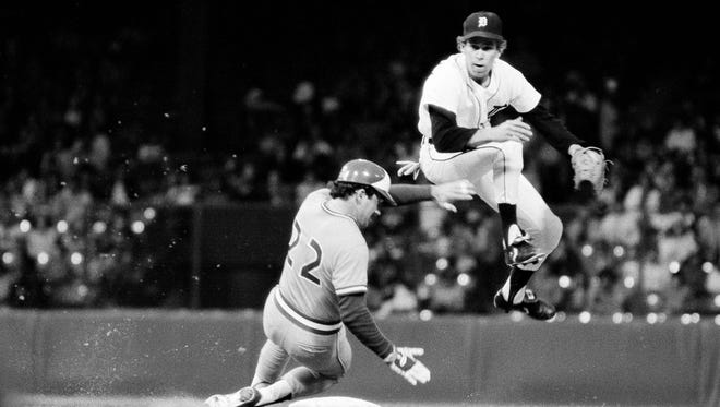 Detroit Tigers Alan Trammell jumps to gain some altitude avoiding a collision with Toronto's Rick Bosetti during a second base double play in the third inning at Tiger Stadium in Detroit, July 4, 1978.