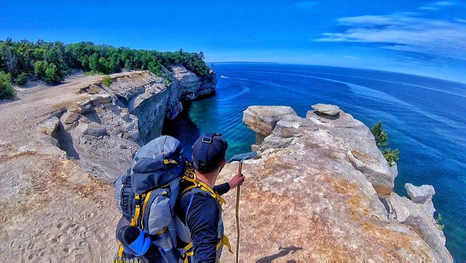 Michael Palko of Traverse City backpacked the entire shoreline of Pictured Rocks National Lakeshore, stopping at Grand Portal Point for a selfie he calls "Picture Perfect." "One minute you're on a sandy beach, the next you're 100 feet above the water of Lake Superior!" he said. "The view was breathtaking."