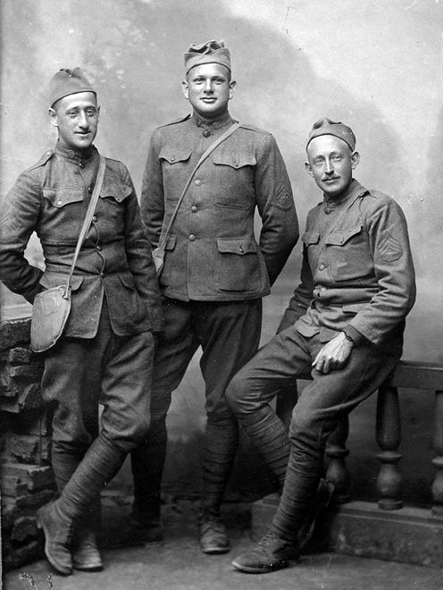 Sgt. Charles W. Carman, center, was a horseshoer in Madison, Wis., when President Wilson activated the National Guard units in Michigan and Wisconsin to fight in World War I.