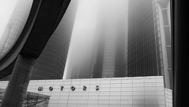 The curve of the People Mover track, the straight lines of the General Motors entrance at the Renaissance Center, and the morning mist filtering through the towers create a sophisticated piece of modern art in "Motor House," by Andrew Krupp of Rochester Hills.